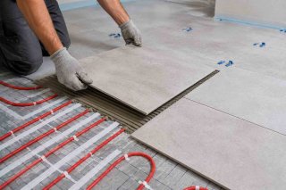 Pose de carrelage sur chauffage au sol